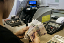 Thị trường tiền tệ trong nước biến động khi tài chính thế giới bất ổn