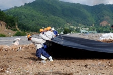 Chi 12,5 tỷ đồng phủ bạt để giảm mùi hôi ở bãi rác Khánh Sơn