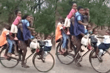 Hình ảnh thú vị: Người đàn ông châu Phi đạp xe chở 9 đứa bé