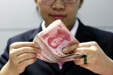 TQ: Gửi hoặc rút tiền mặt từ 50.000 tệ cần đăng ký nguồn tiền