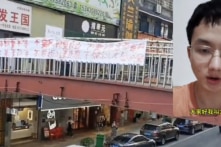 Người treo biểu ngữ chống ĐCSTQ nói bị đàn áp kiểm soát não bộ