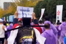 TQ: Giáo sư đại học Nam Kinh bị bắt vì kêu oan trong cuộc chạy marathon